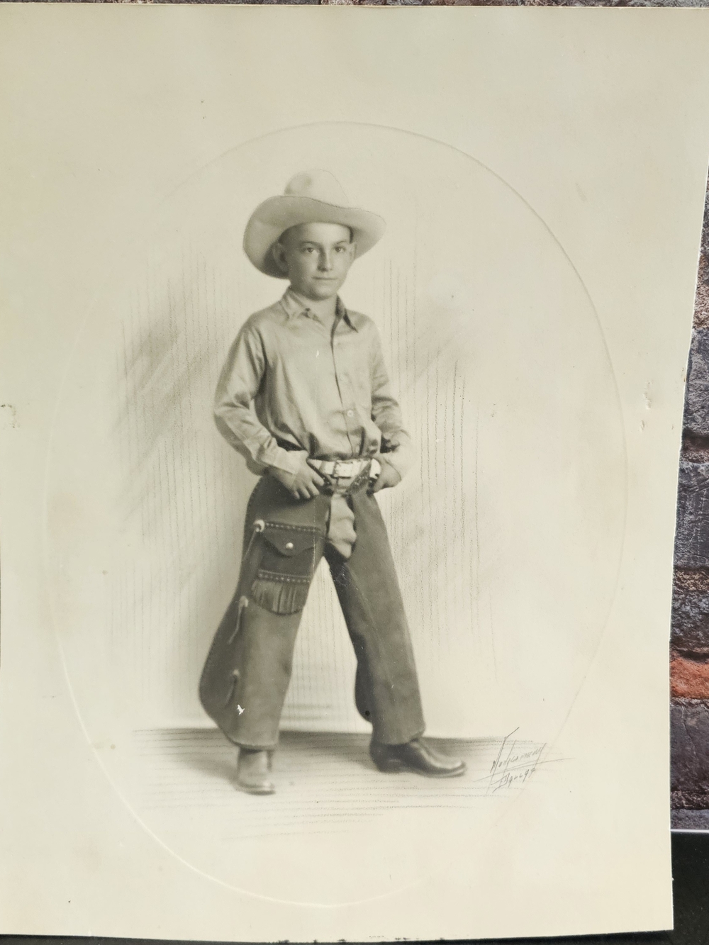 Source Unknown Vintage Cowboy Boy Portrait in Sepia Tones